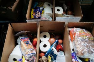 Boxes of food and supplies from New Orleans Mutual Aid Society.
