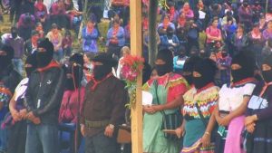 Zapatista supporters in masks at Viva Zapata Film Series event.